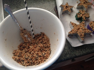 Mixing up bird seed for ornaments